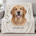 Personalized pet photo blanket with a golden retriever portrait and the name Charlie, displayed on a sofa; design preview.